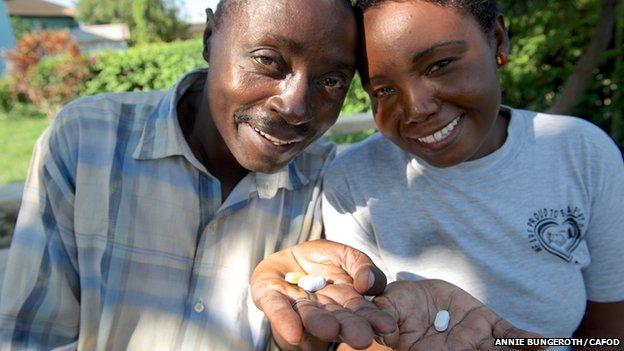 David and Margaret holding ARVs in Mombasa, Kenya