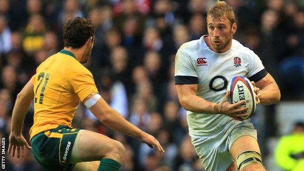 England captain Chris Robshaw takes on Australia's Nic White in the 20-13 win last year