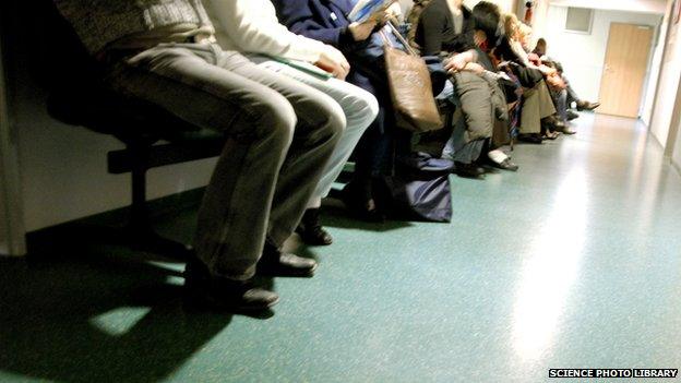 Patients queuing to be seen in hospital