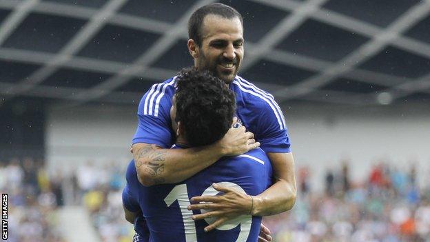 Cesc Fabregas celebrates with Diego Costa