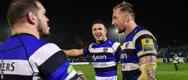 Burgess celebrates with his Bath team-mates