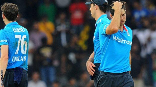 England captain Alastair Cook (right)