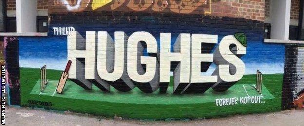 A special piece of graffiti is displayed on wall in Perth in homage to Phillip Hughes