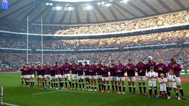 England and Australia held a minutes applause for Phillip Hughes before their match at Twickenham