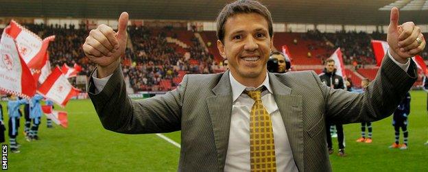 Juninho signs autographs for fans on his return to the Riverside Stadium