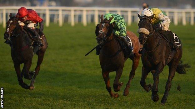 Many Clouds wins the Hennessy Gold Cup at Newbury