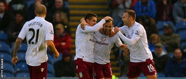 Joe Cole celebrates his opener for Villa