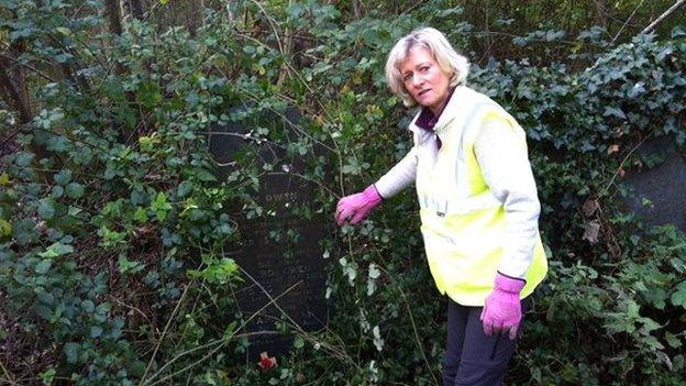 Anna Bitowski says her grandfather's grave was almost inaccessible at some times of the year because of the thick vegetation around it