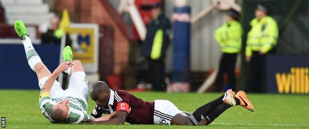 Morgaro Gomis (right) two-footed challenge on Scott Brown led to an early red card.