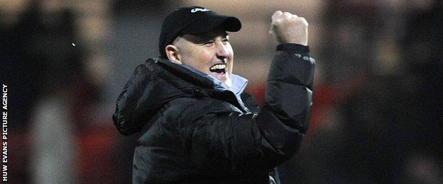 Russell Slade celebrates Cardiff City's win at Watford