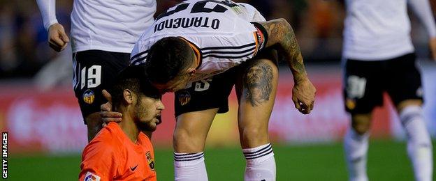 Nicolas Otamendi of Valencia and Barcelona's Neymar