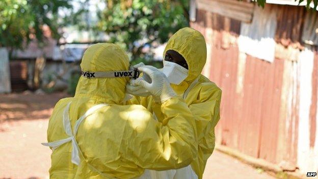 Health workers at the Kerry Town treatment centre, on the outskirts of Freetown (13 November 2014)