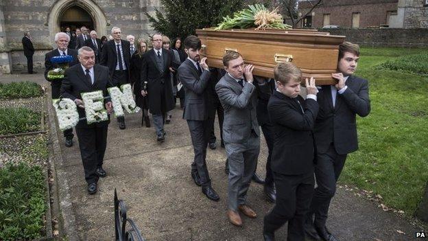 Friends and family carry the coffin of Ben Pocock