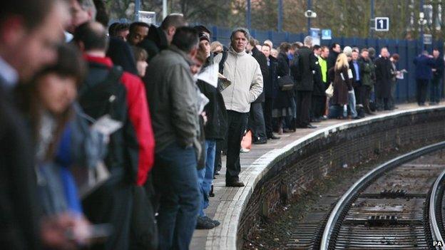 Passengers waiting at London Bridge station