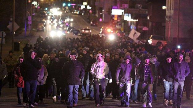 Bosnian protestors march through St Louis following the murder of Zemir Begic.