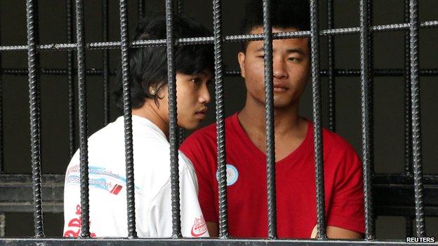 Win Zaw Htun (L) and Zaw Lin in a jail cell