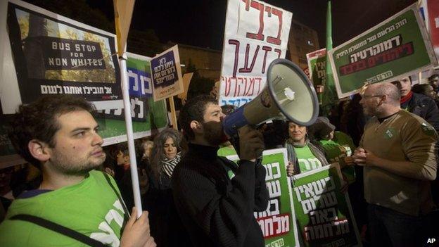 Left-wing Israelis protest in Jerusalem against a bill designed to strengthen the Jewish nature of the Israeli state (29 November 2014)