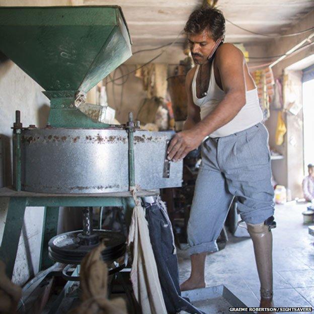 Bhagarath working in the flour mill