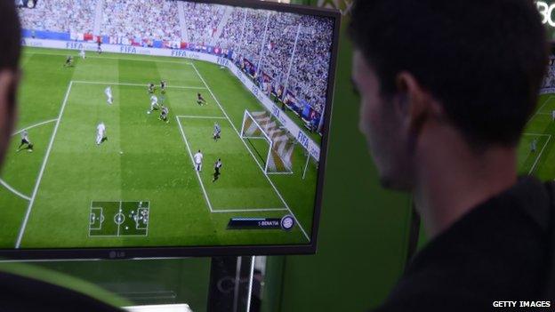 Gamers playing FIFA