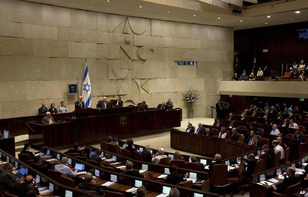 Israel's Prime Minister Benjamin Netanyahu speaks during the opening session of the Knesset, Israel's parliament, in Jerusalem, Monday, Oct. 27, 2014