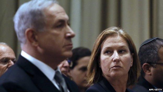 Israeli Prime Minister Benjamin Netanyahu sits next to Israeli Justice Minister Tzipi Livni during an award ceremony in November 2014