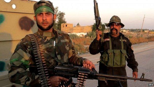 Members of the Iraqi Shia militia, Kataib Hezbollah (Hezbollah Brigades) near Jurf al-Sakhar (28 October 2014)