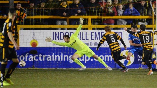 Alloa's Ryan McCord (8) side foots into the back of the net to equalise for his side