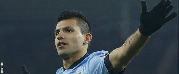 Sergio Aguero celebrates scoring his second goal against Sunderland