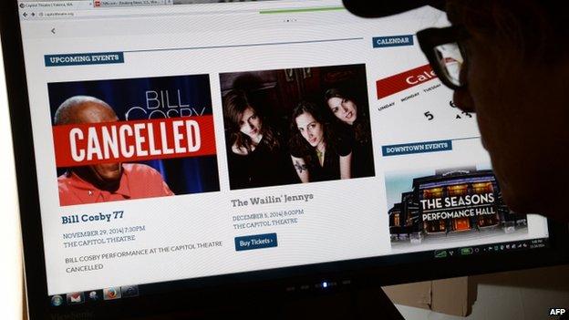 Viewer looks at a website of Capitol Theatre in Yakima, Washington, on 24 November 2014