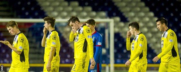 St Mirren and Inverness players leave the field at Caledonian Stadium