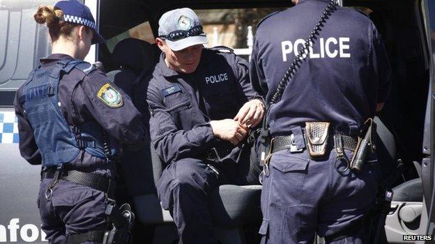 Police raise a house in Sydney over intelligence of planned attacks (19 Sept 2014)