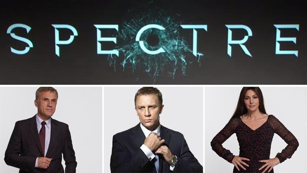 Christoph Waltz, Daniel Craig and Monica Bellucci beneath the Spectree logo