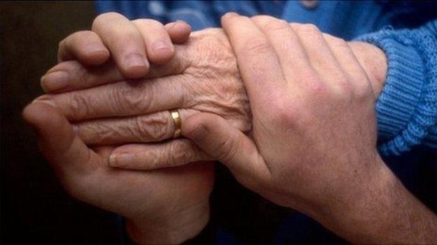 Holding hands with a cancer a patient