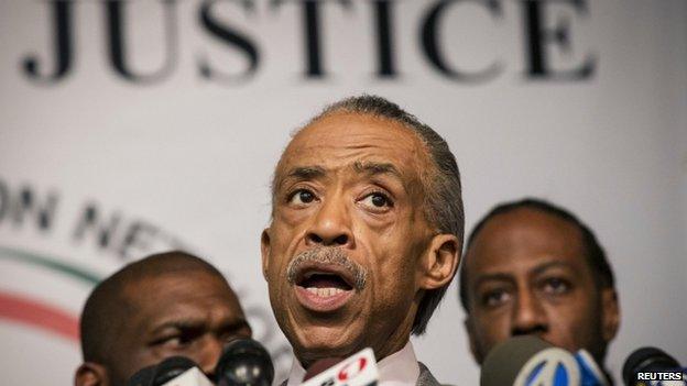 Civil rights activist Al Sharpton (centre) appeared in New York on 4 December 2014