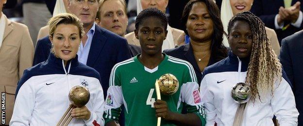 Asisat Oshoala collects the Golden Ball trophy at the U20 Women's World Cup