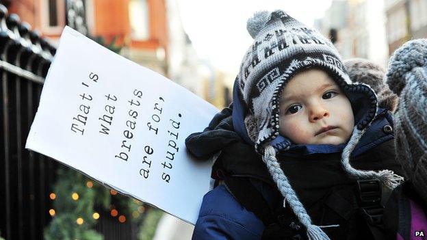 Baby and a sign outside Claridge's