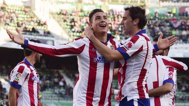 Atletico Madrid's Jose Maria Gimenez (left) celebrates scoring the opening goal