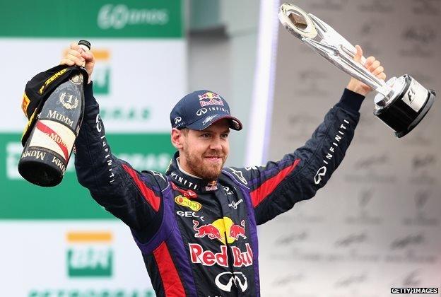 Sebastian Vettel with the Brazilian Grand Prix trophy in November 2013