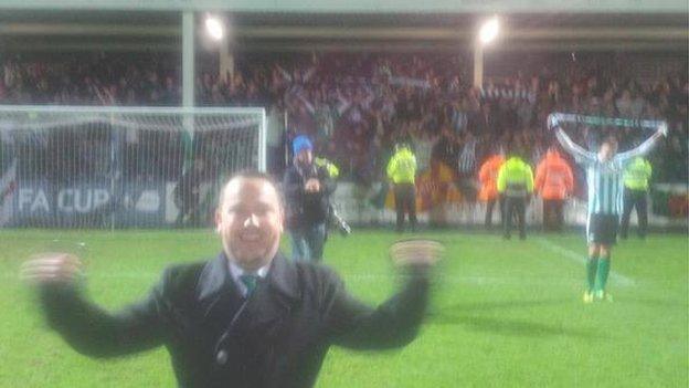 Mark Carruthers celebrates Blyth's win on the pitch