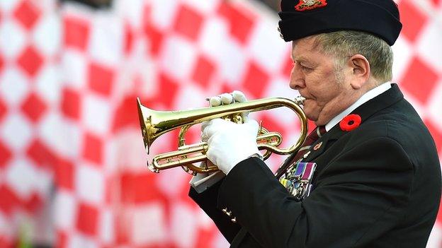 The Last Post is played as part of Football Remembers week