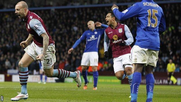 Alan Hutton celebrates scoring for Aston Villa against Leicester City