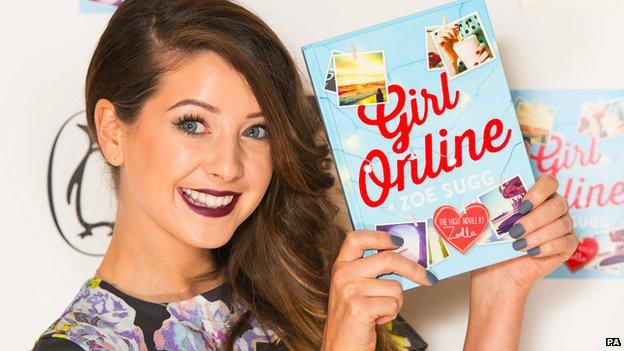 Zoella holding Girl Online