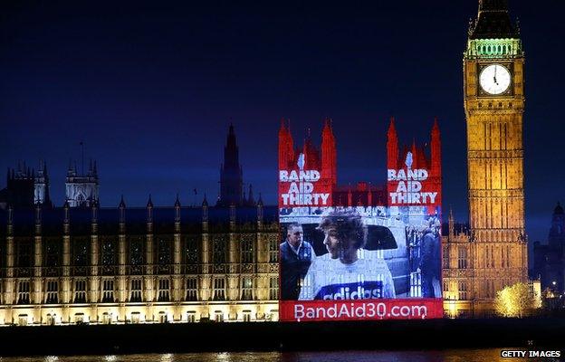 Band Aid 30 projected on the House of Commons