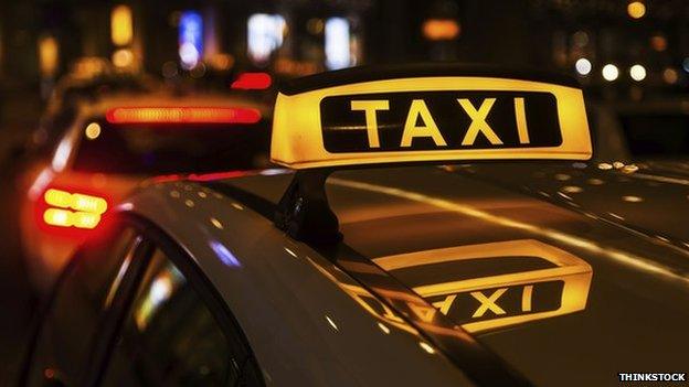 A taxi at night