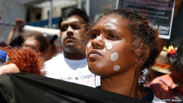 A woman attends a march to protest for aboriginal rights. Photo: November 2014