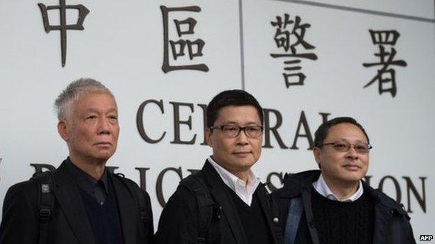 Benny Tai (R), an original founder of the pro-democracy Occupy movement, Chinese Cardinal of the Catholic Church and former bishop of Hong Kong, Joseph Zen, Chu Yiu-ming and Chan Kin-man surrender to police in Hong Kong on 3 December 2014