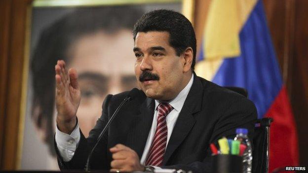 President Nicolas Maduro speaks during a cabinet meeting at Miraflores Palace in Caracas on 2 December, 2014