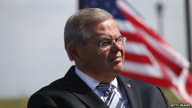 US Senator Robert Menendez prepares to speak at a naturalization ceremony at Liberty State Park on 19 September 19, 2014