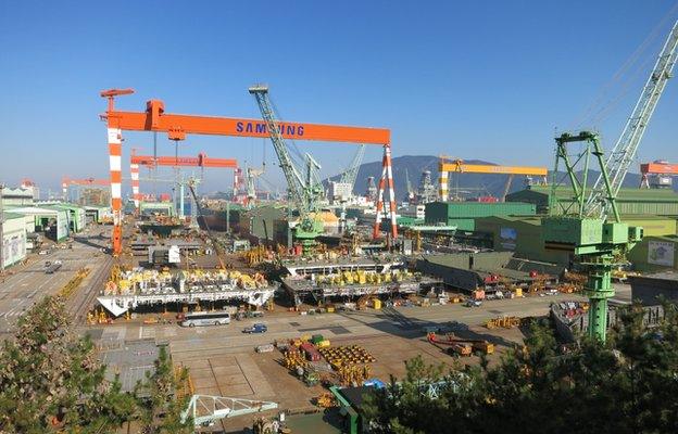 Buses and cars in the shipyard