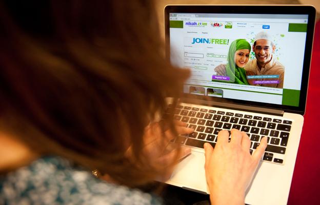 A woman looking at a dating website